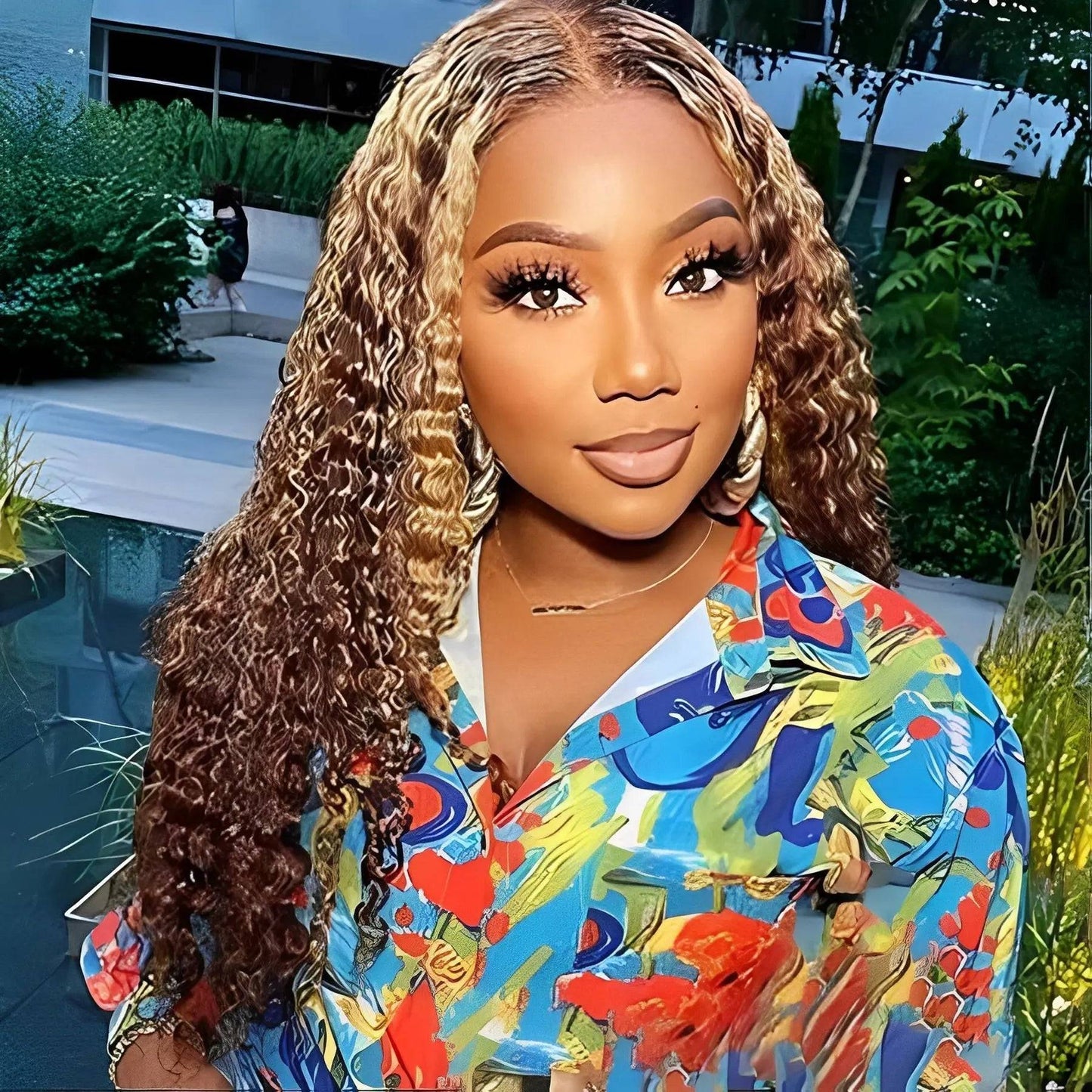 4/27 highlight Brazilian kinky curly pre-plucked virgin human hair wig with 180% density. Transparent lace front closure for a natural look.