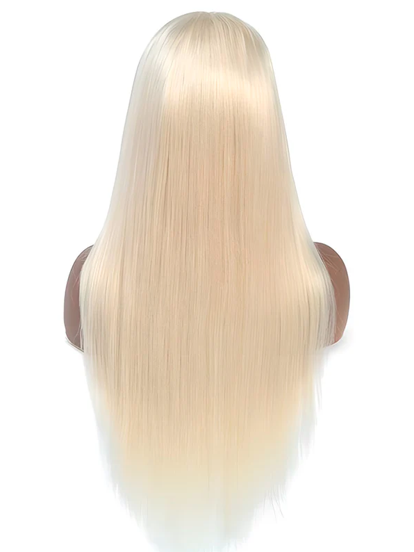 Blonde wig on a mannequin head against a white background