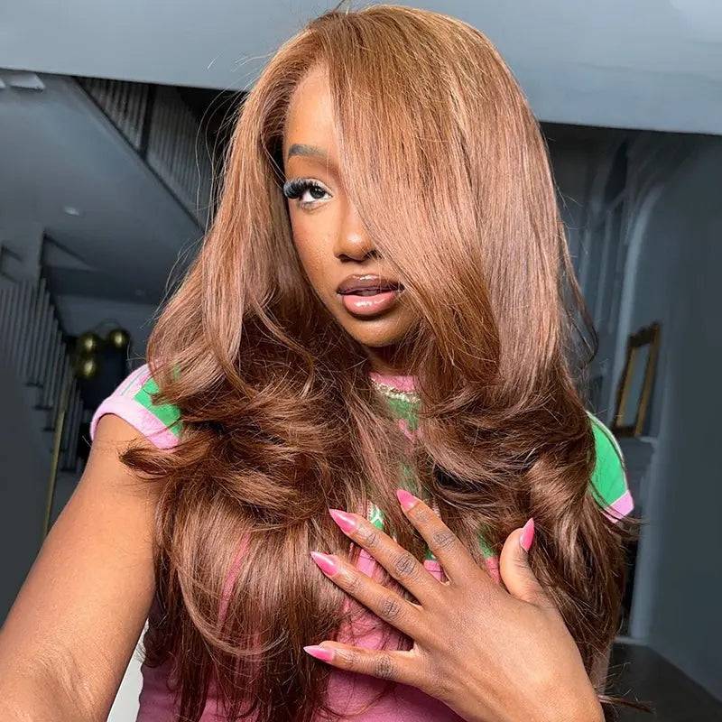 Chestnut brown body wave human hair wig with 5x5 lace front, worn by a model. Features 180% density for a voluminous, natural look.