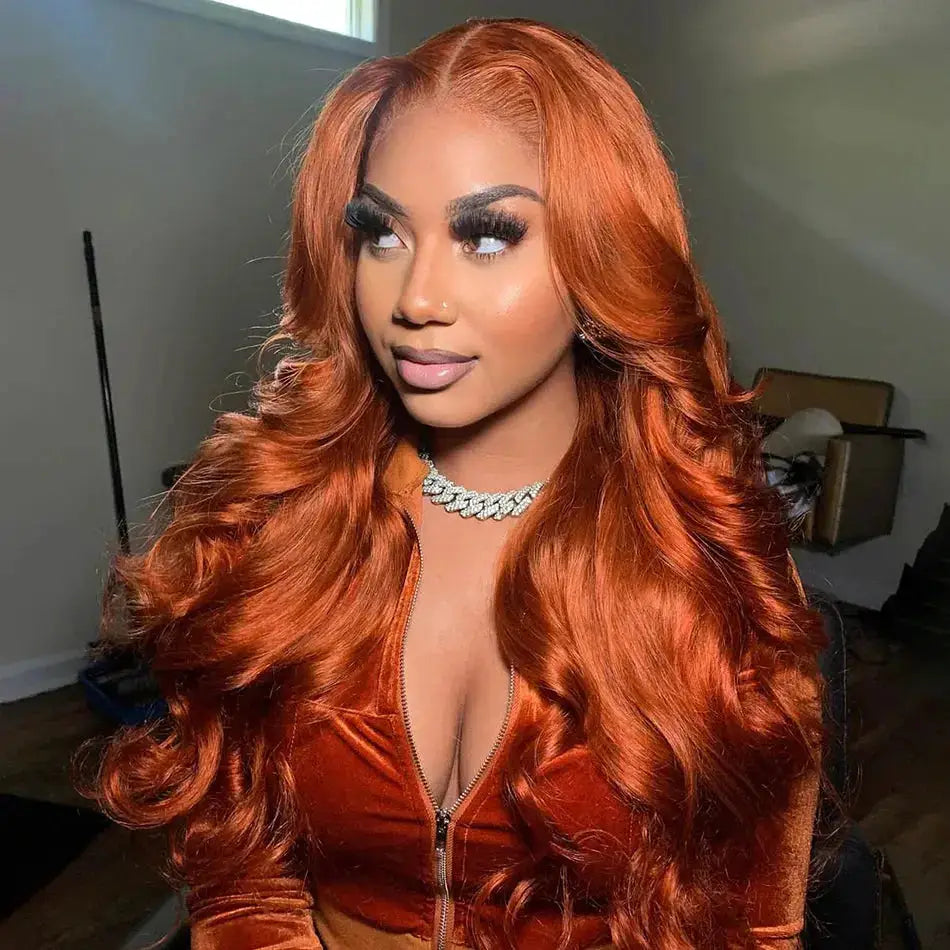 Ginger #350 orange body wave wig styled on a model, featuring a 5*5 transparent lace closure for a natural look. 100% human hair with 180% density.