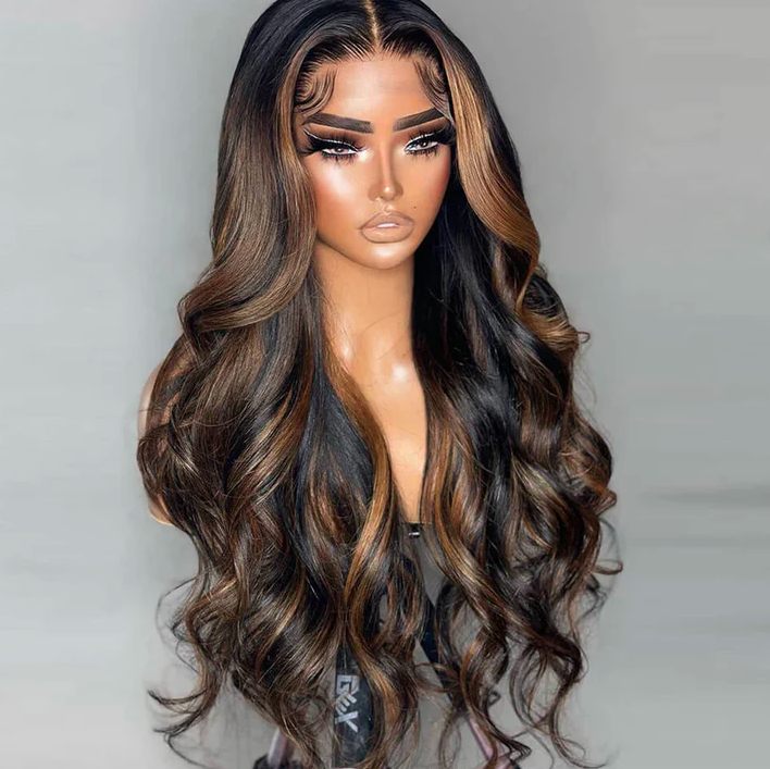 Woman wearing a long, wavy brown wig on a plain background