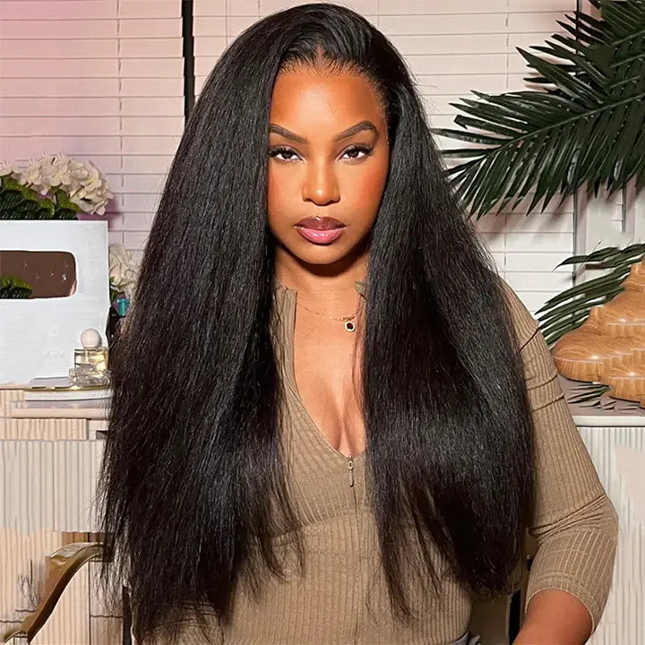 Wear & Go glueless kinky straight lace closure wig with HD lace, styled on a model for a voluminous and natural appearance.