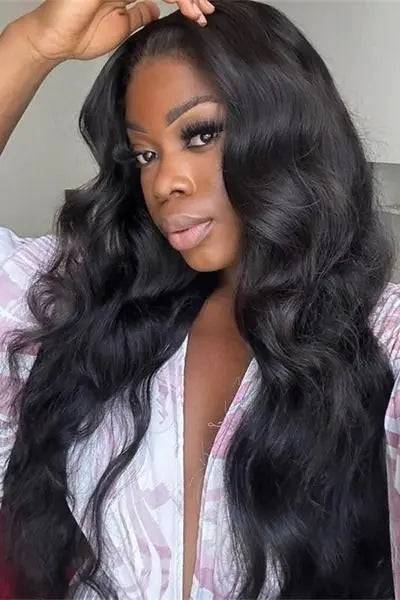 Body Wave HD Swiss Lace 13*4 Human Hair Wig worn by a model, showcasing its voluminous waves and undetectable lace frontal for a flawless finish.