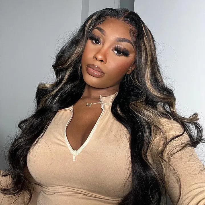 Model wearing P1B/27 balayage highlights glueless body wave human hair wig with black honey blonde tones and pre-plucked hairline.