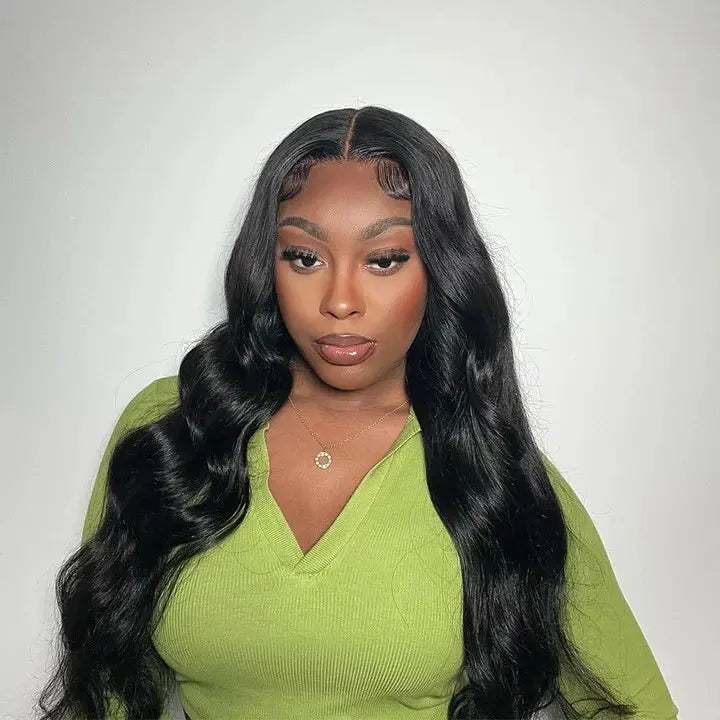 Achieve a flawless look with our Transparent Body Wave Lace Closure Wig, made from 100% unprocessed human hair. Featuring soft, natural body wave curls, the transparent lace ensures a seamless, undetectable hairline for a beautifully realistic appearance and easy styling.