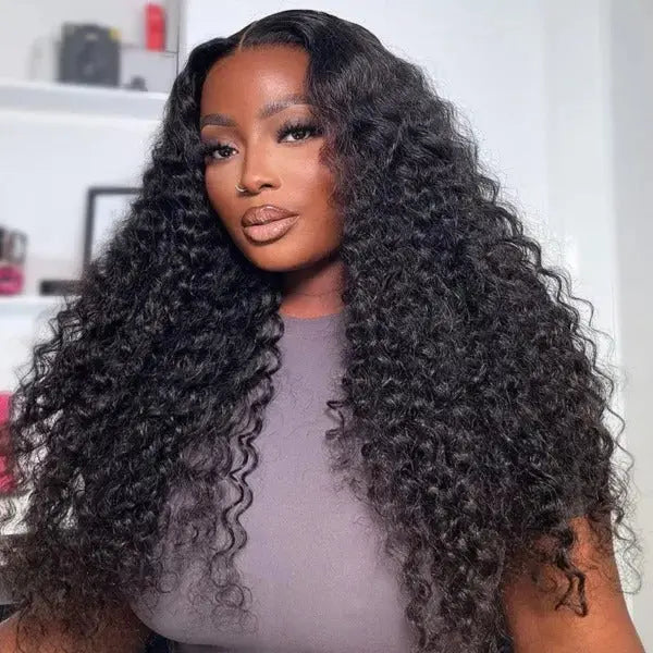 Model flaunting the Wear & Go 9*6 HD Lace Closure M-Cap Pre-Cut Wig with natural black deep curly texture and a flawless hairline.