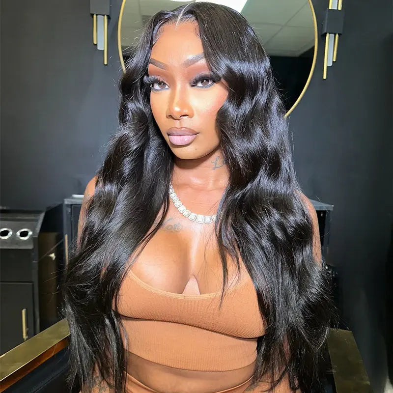 Wear & Go Glueless 9*6 HD M-Cap Body Wave Wig in natural black with pre-bleached knots and pre-plucked hairline for a seamless look.