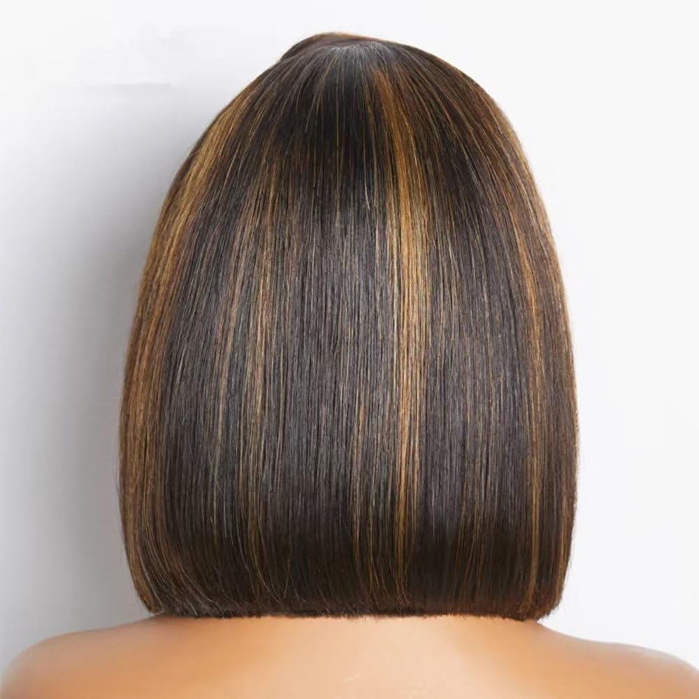 Back view of a person with a stylish haircut on a plain background